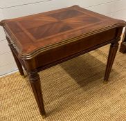 A regency style side table on fluted legs and drawer (H56cm W67cm D58cm)