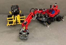 Two Lego Technic model, A Bulldozer and a crane with grabber