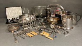 A quantity of silver plate, pewter and white metal items to include cutlery, bowls, tankard and a