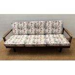 A Medicom Toy Japanese's Futarigake sofa, three seater with designer fabric (H72cm W177cm D56cm)