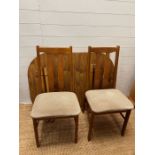 A Mid Century Formica table with four chairs