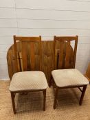 A Mid Century Formica table with four chairs
