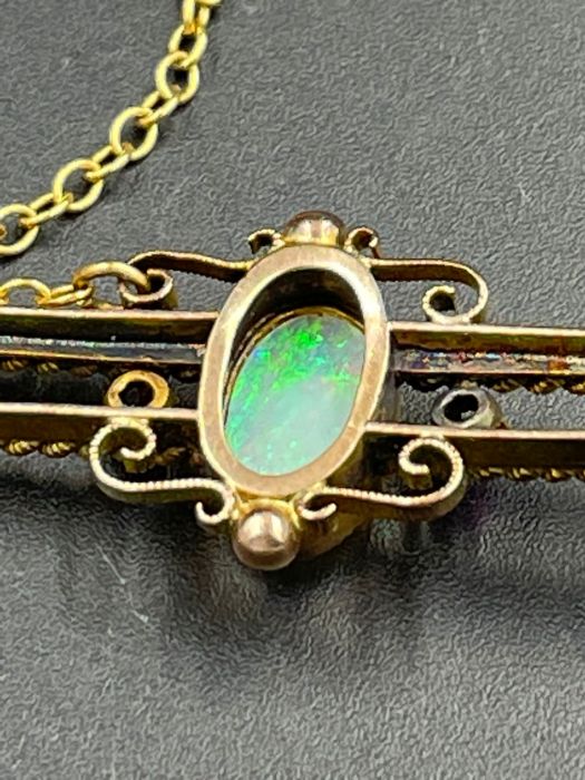 An Opal and ruby brooch in a gold setting AF - Image 5 of 5