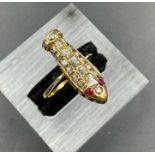 An old cut diamond ring in a gold setting in the form of a coffin. Size S
