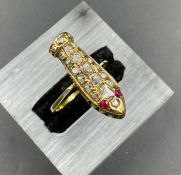 An old cut diamond ring in a gold setting in the form of a coffin. Size S