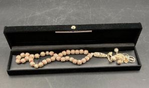 An Arabian silver set of prayer beads.