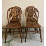 Four oak vintage wheel back dining chairs