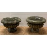Two green baroque style marble planters and urns