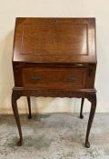 A walnut veneered ladies bureau or writing desk on cabriole legs AF (H96cm W54cm D40cm)