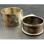 Two silver napkin rings including one by Goldsmiths and Silversmiths 1903.