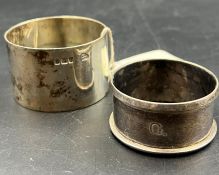 Two silver napkin rings including one by Goldsmiths and Silversmiths 1903.