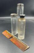 Three silver topped glass bottles and an AF silver mounted comb
