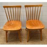 Two pine spindle back chairs