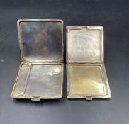 A hallmarked silver cigarette case and a compact