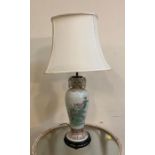 A Chinese style table lamp with floral motif