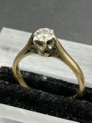 A 9ct gold diamond ring (Stone 4mm in diameter, approximate total weight 2.2g) Size K