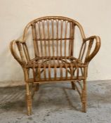 A bamboo boho arm chair