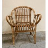 A bamboo boho arm chair