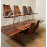 A Hans Brattrud for Hove Mobler dining suite comprising of an extendable two leaf dining table and