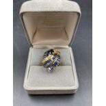 A contemporary Sapphire and diamond dress ring., two missing sapphires.