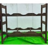 A pair of beer barrel racks for six barrels (H190cm W214cm D82cm)