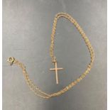 A 9ct gold cross on chain (Approximate Total weight 2.5g)