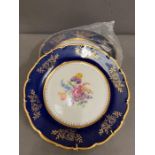 Three cobalt blue floral plates