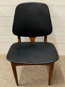 An Elliott's of Newbury Mid Century chair with black vinyl seat pads