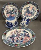 A large selection of vintage china to include platters, cheese dish and domed dish.