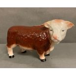 A vintage Melba Ware Hereford bull figurine