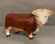 A vintage Melba Ware Hereford bull figurine