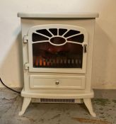 A white wood burner effect electric heater