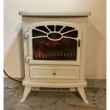 A white wood burner effect electric heater