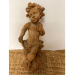 A carved wooden wall hanging cherub (H50cm)