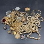 A selection of costume jewellery to include a selection of pearl necklaces.