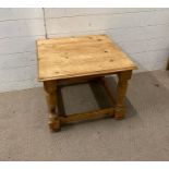 A pine square coffee table on turned legs with bun feet (H45cm Sq57cm)