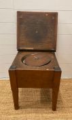 An antique oak commode with ceramic insert (H47cm W43cm D42cm)