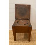 An antique oak commode with ceramic insert (H47cm W43cm D42cm)