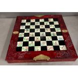 A Contemporary Oriental themed chess set.