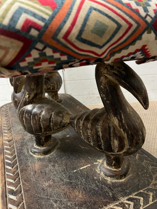 A South African carved bench seat with a Kilim style, upholstered and four carved birds to back - Image 5 of 6