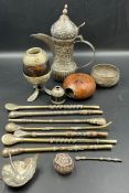 A selection of pipes, drinking cups and coffee pots
