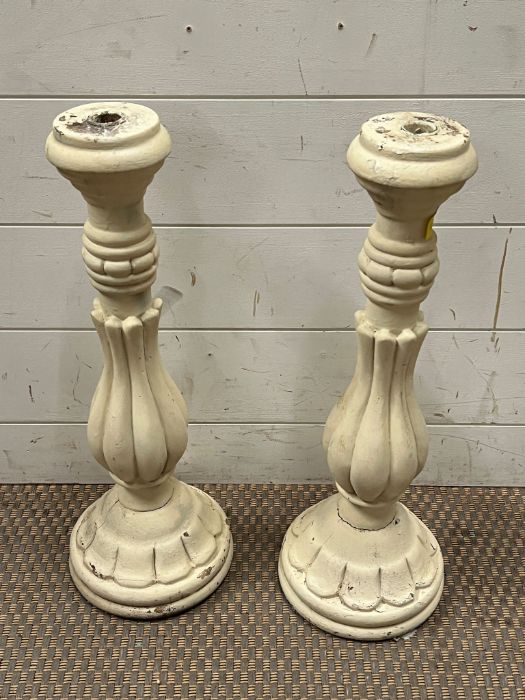 A pair of painted candlestick holders (H51cm)
