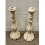 A pair of painted candlestick holders (H51cm)