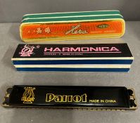 Three Harmonicas