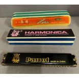 Three Harmonicas