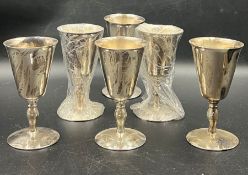 Six white metal goblets/chalices