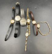 A selection of vintage wristwatches including Timex