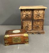 A wooden storage chest and a brass bound box