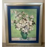 A framed print of white roses in the style of Van Gogh