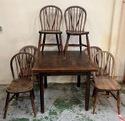 Six hoop back spindle chairs with square pull out table